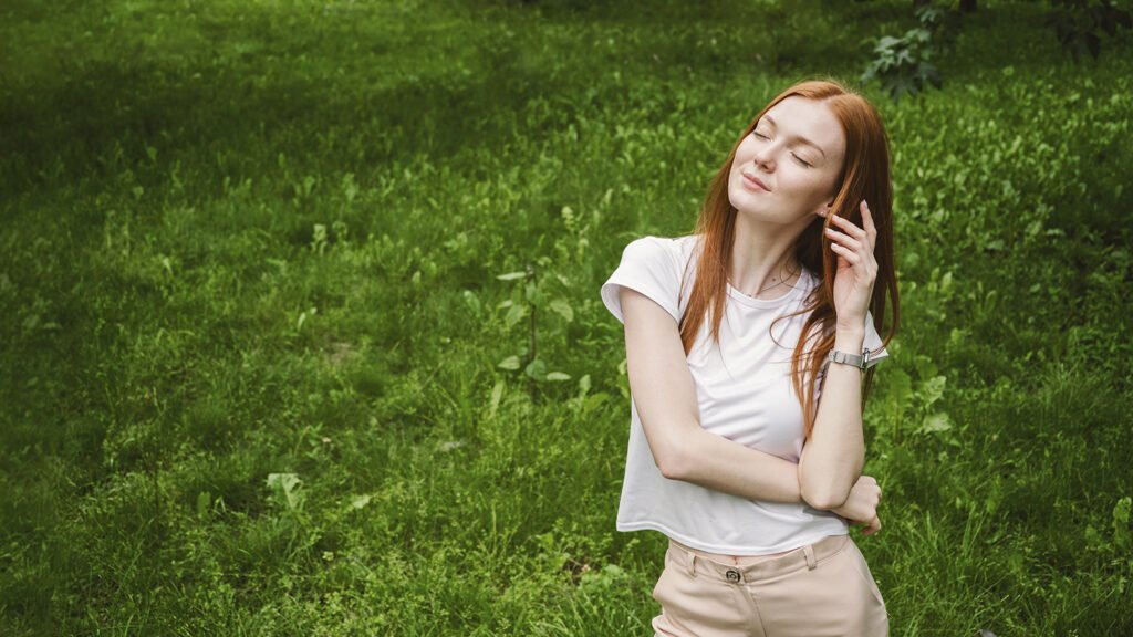 Image of a girl in a field for a blog about emotional boundaries